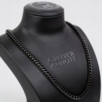 Collar trenzado negro...